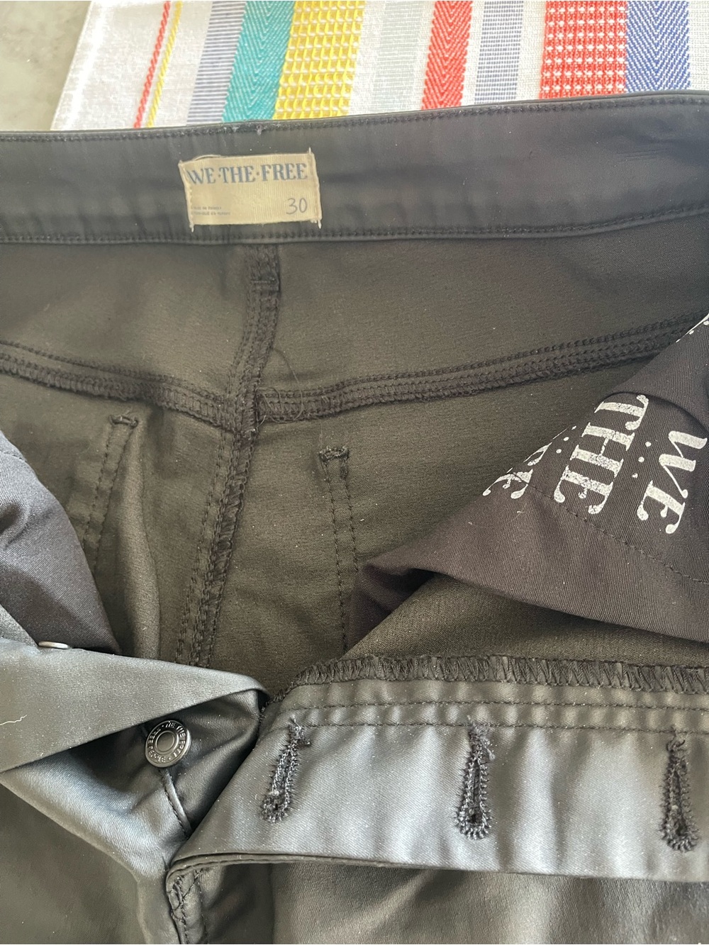 Free People We The Free Pacifica black high-rise coated slim straight pants.